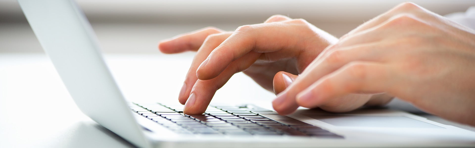 typing on laptop | Cloninger Ford of Salisbury